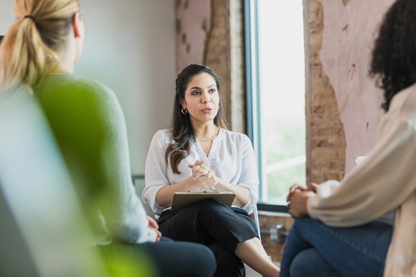 Women Sitting Together, Sharing Experiences and Finding Support