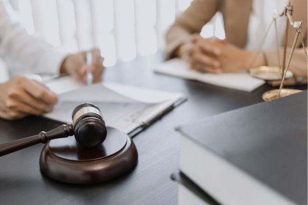 Lawyers with gavel and scales of justice